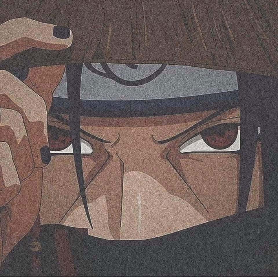 Close Up View Of Itachi Aesthetic With Half Face Covered Showing Sharingan Eyes Wallpaper
