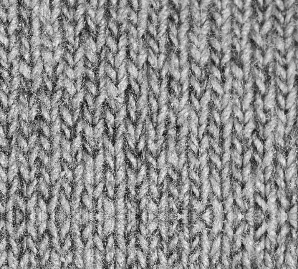 Engverwobener Grauer Pulloverstrick Wallpaper