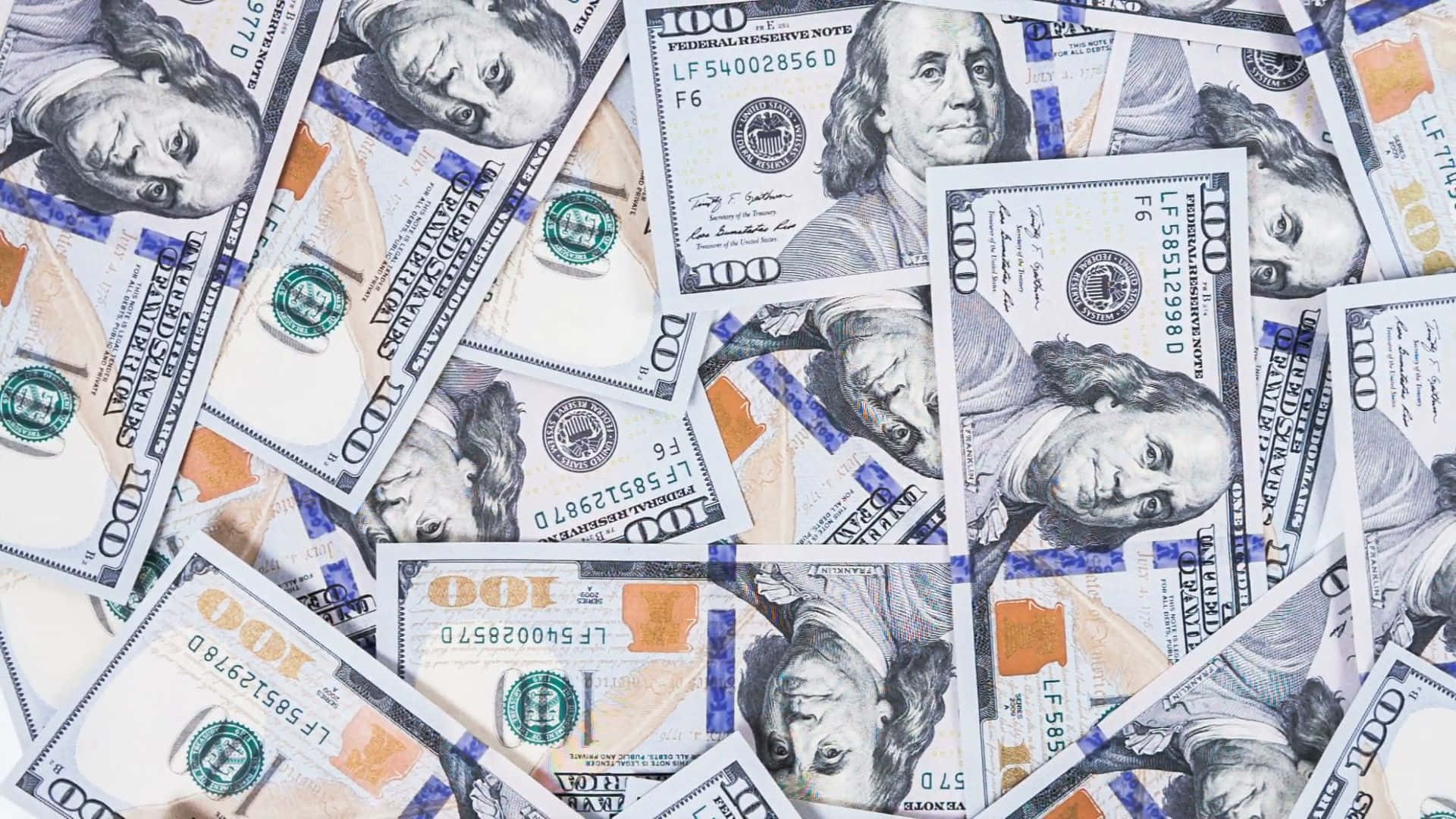 Closeup Photo Of 100 Dollar Bill Pile Wallpaper