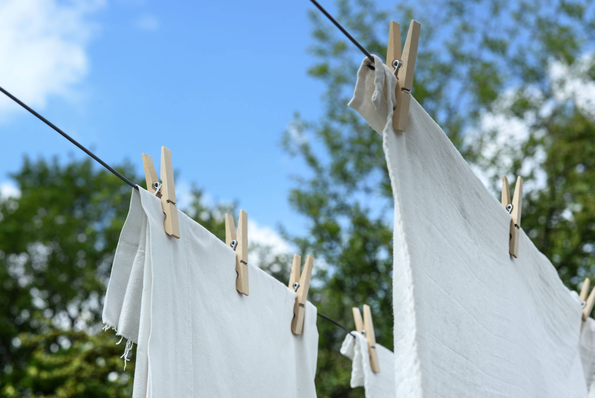 Clothes Line Under The Sun Background