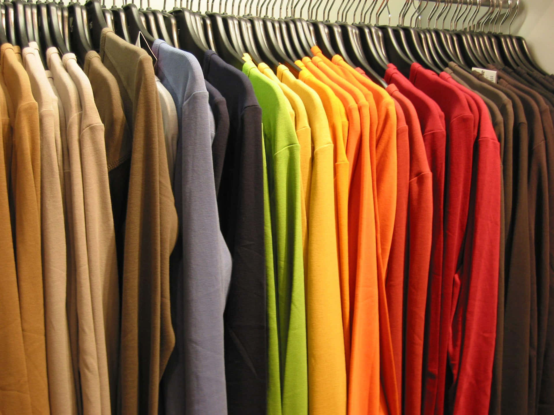 Multicolored Clothes In Clothing Store Picture