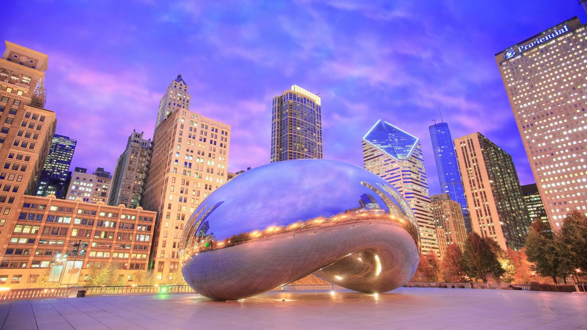 Cloud Gate In Chicago With City Lights Wallpaper