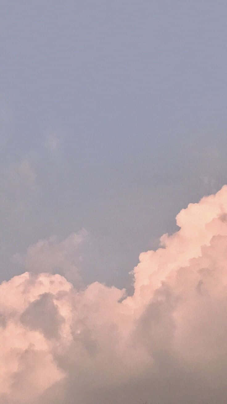 Unavista Impresionante Del Cielo Lleno De Nubes, Mostrando Su Hermosa Y Estética Atracción. Fondo de pantalla