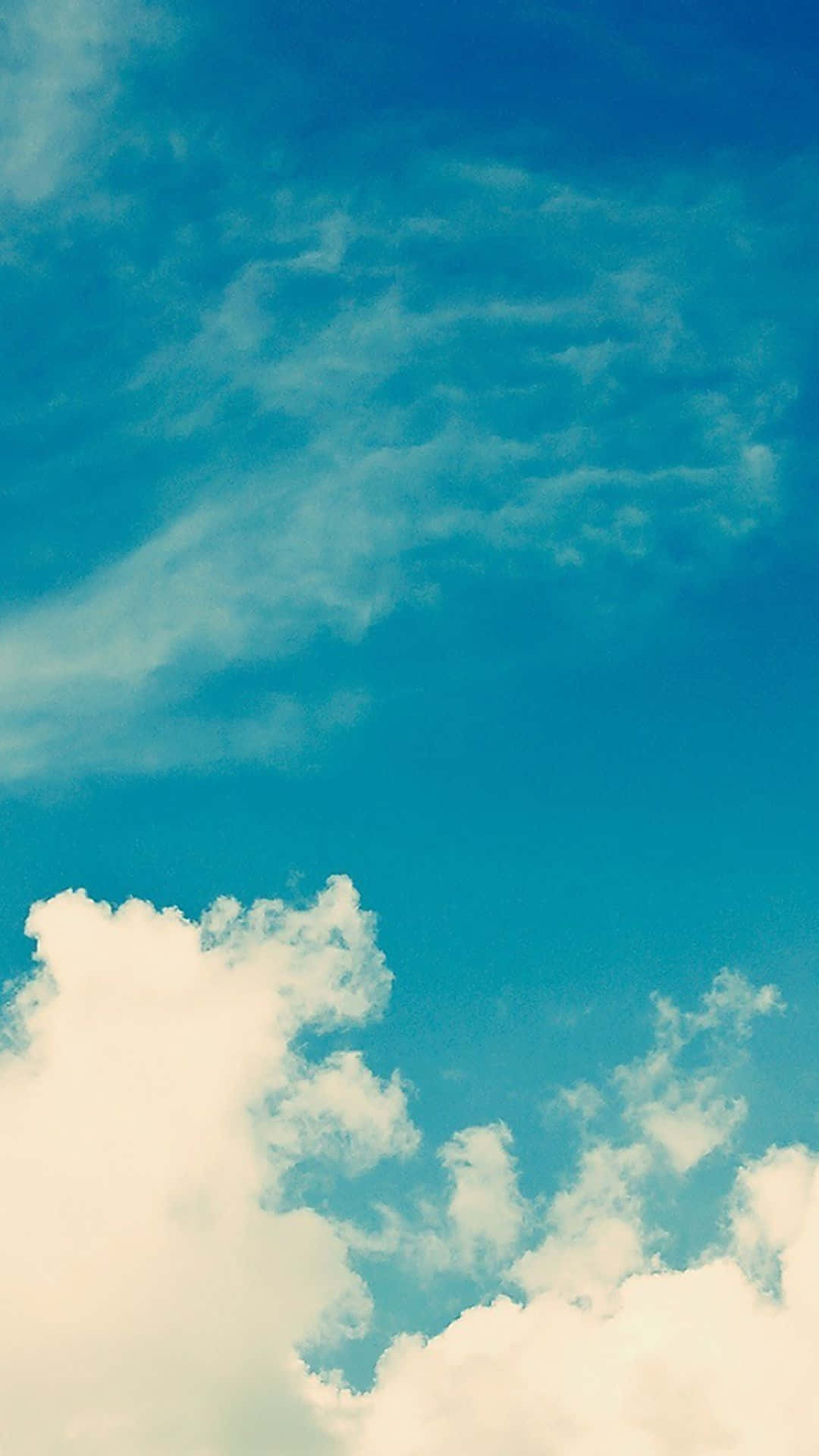 A Cloudy Blue Sky Wallpaper