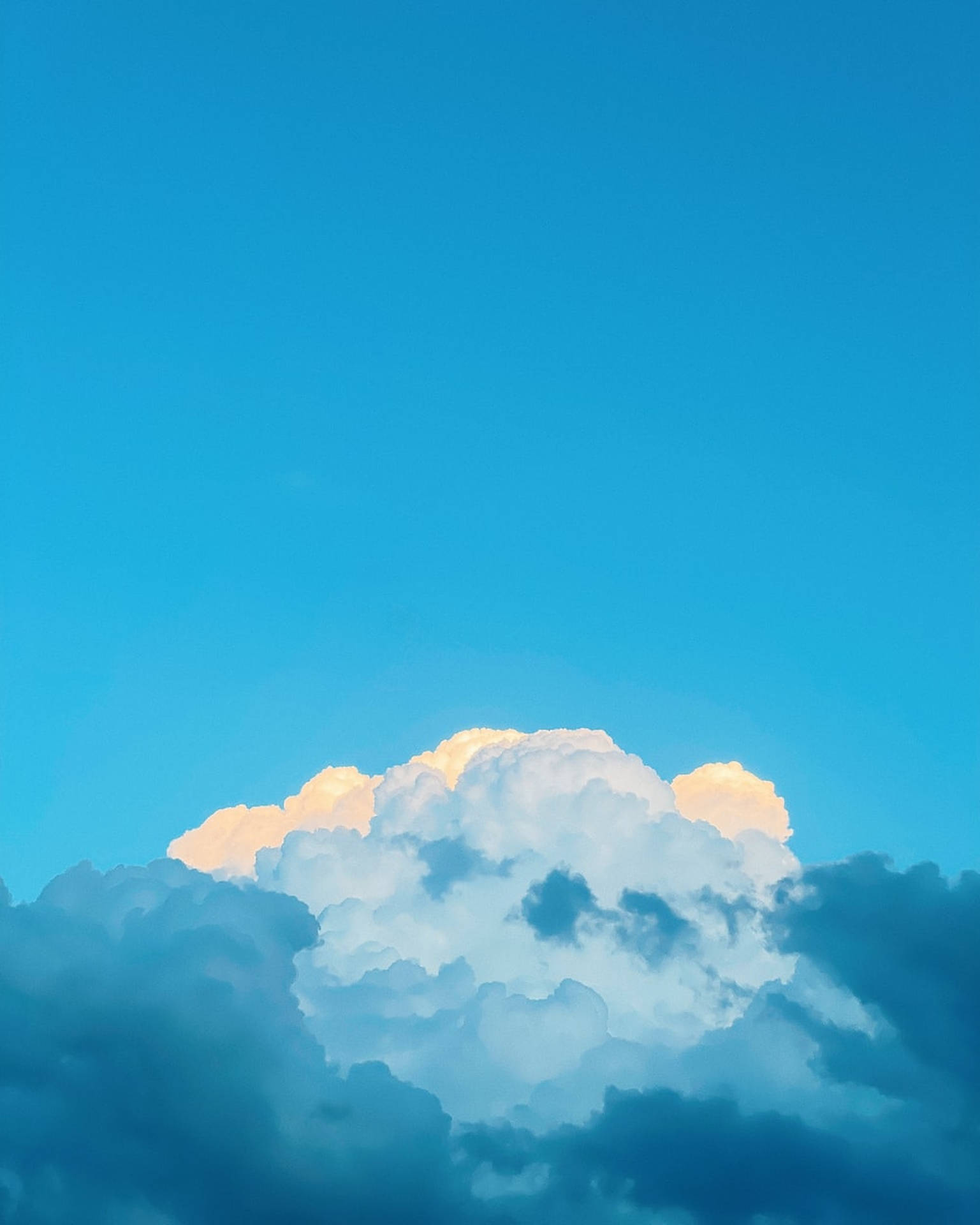 Wolkenvor Pastellfarbenem Himmel-hintergrund Wallpaper