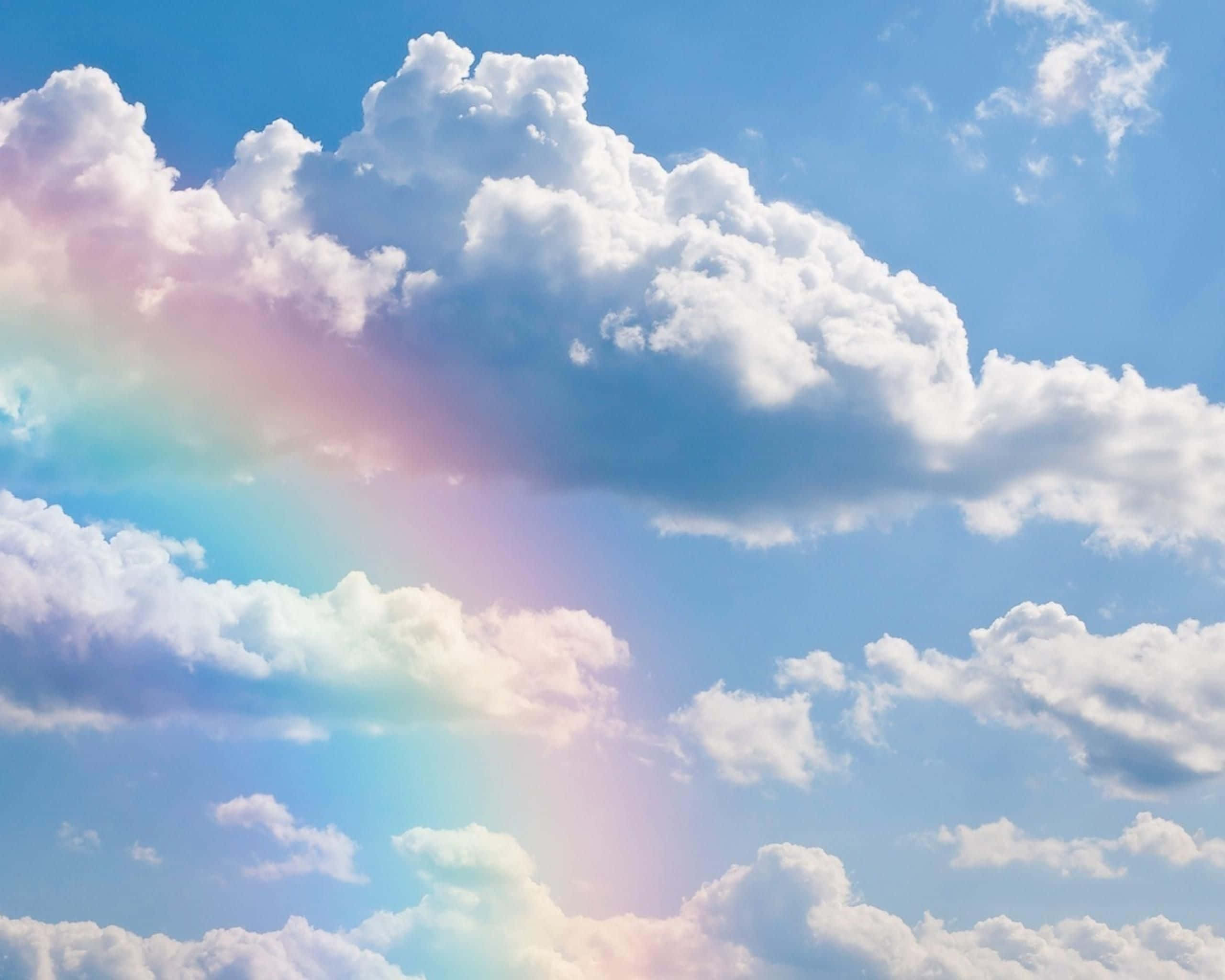 Cumulus Clouds And Rainbow Background