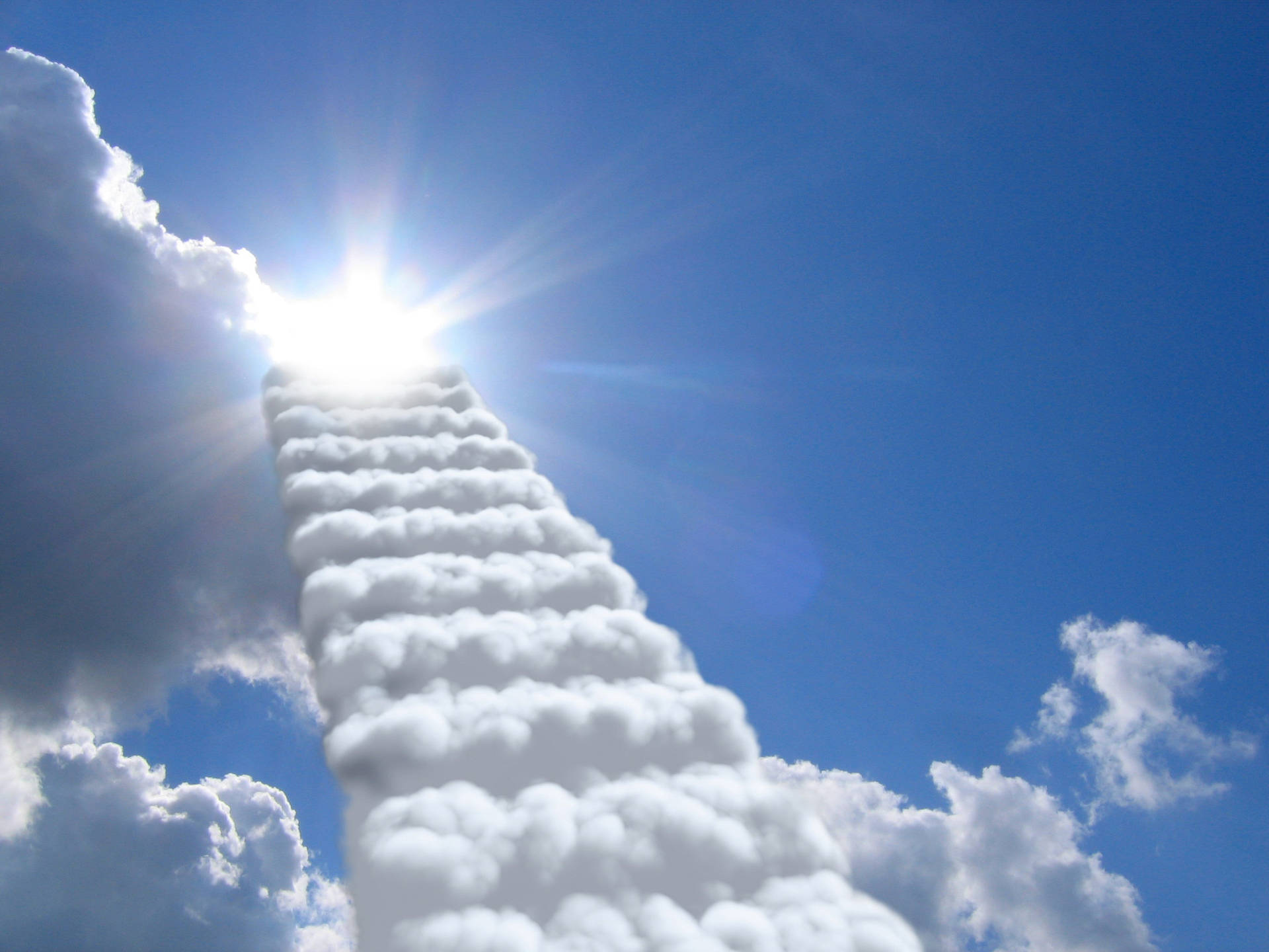 Caption: Majestic Stairway To Heaven Surrounded By Clouds Wallpaper