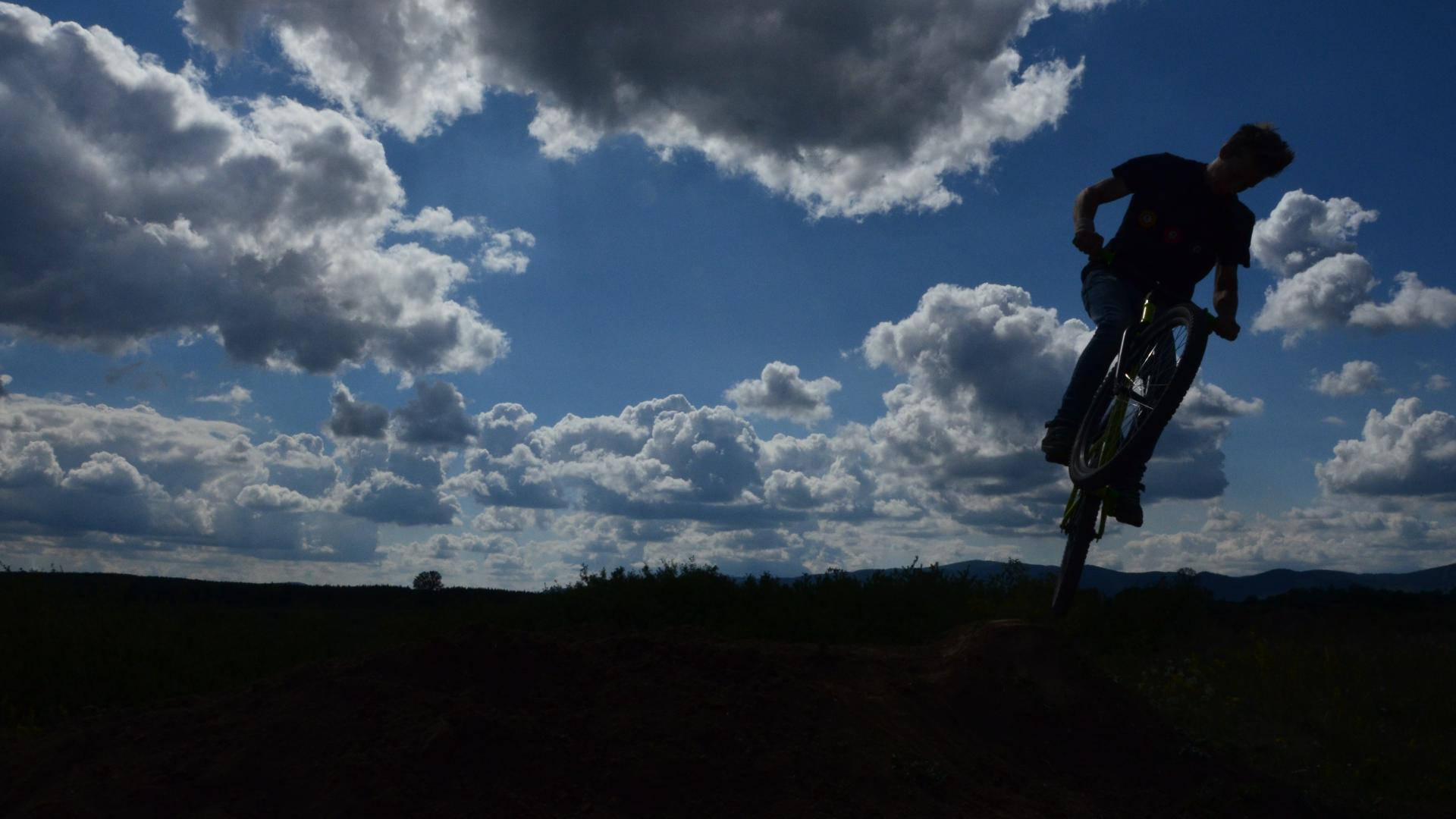 Cloudy Day Mtb Solo Ride Wallpaper