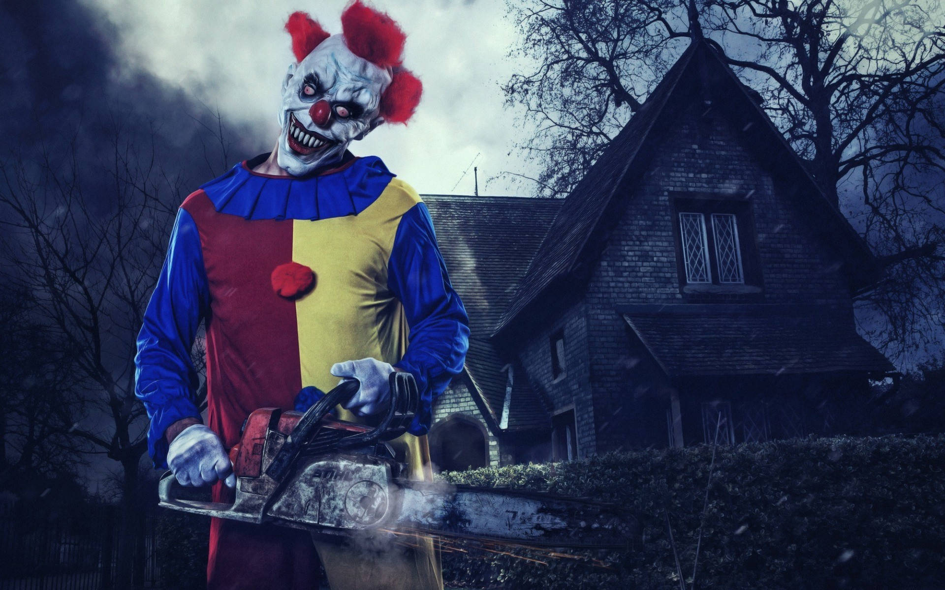 Clown With Chainsaw Wallpaper
