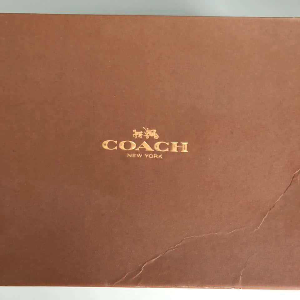 Get organized with stylish Coach accessories