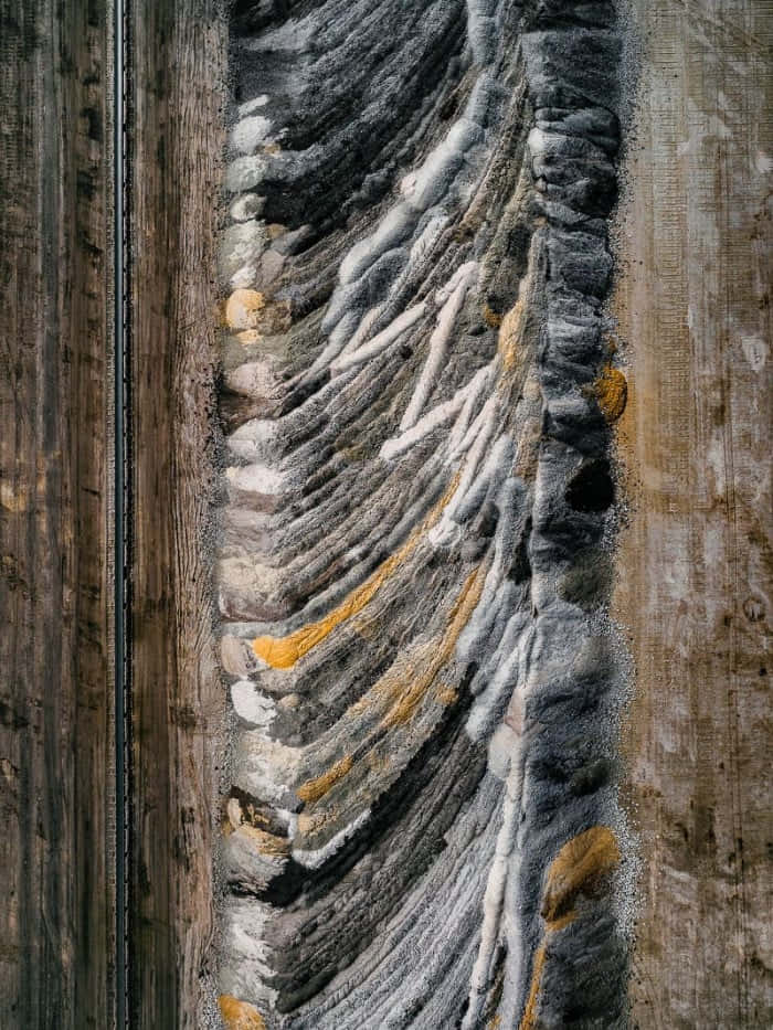 A Painting Of A Wooden Wall With A Lot Of Threads