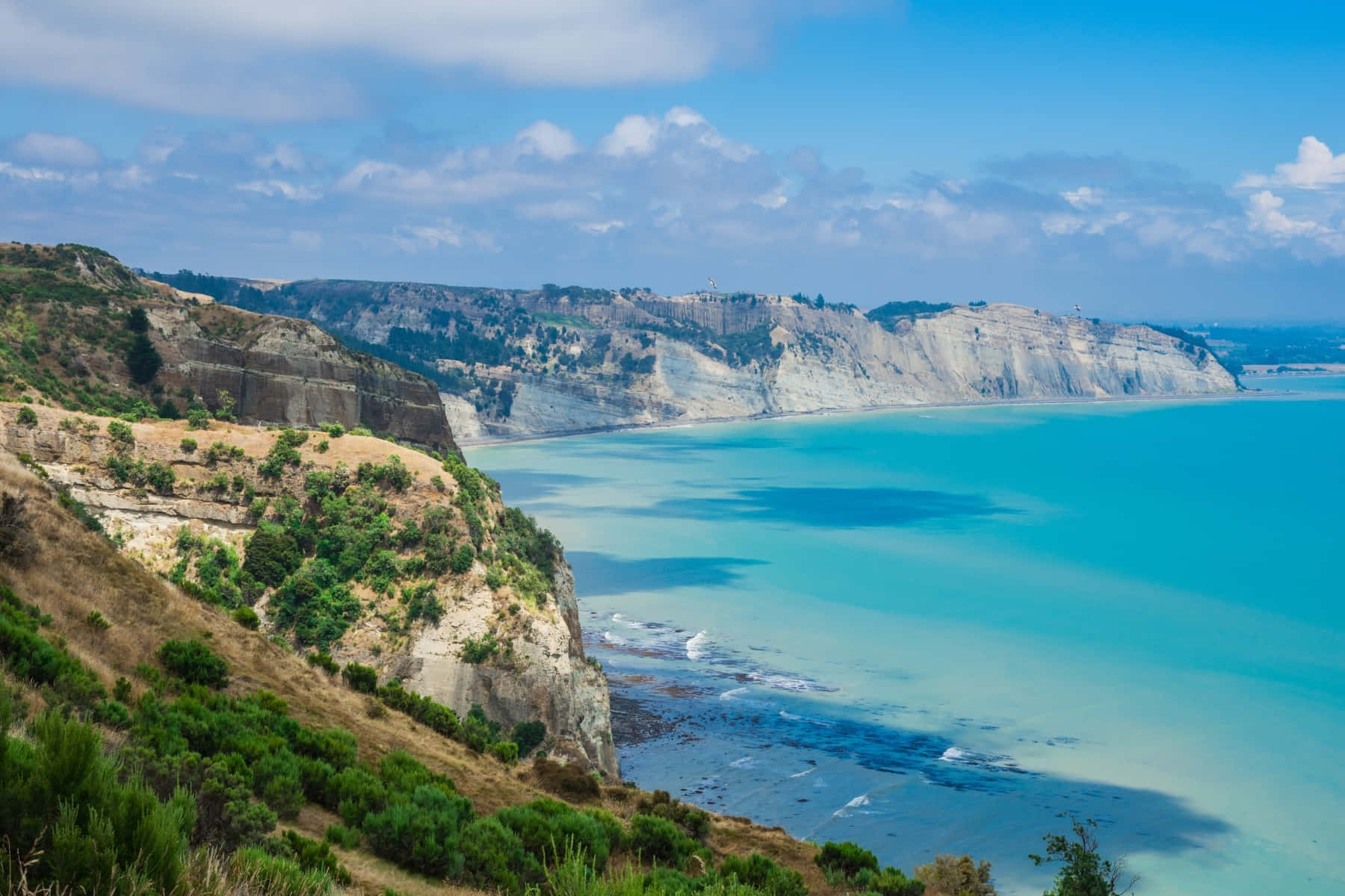 Coastal_ Cliffs_and_ Turquoise_ Waters.jpg Wallpaper