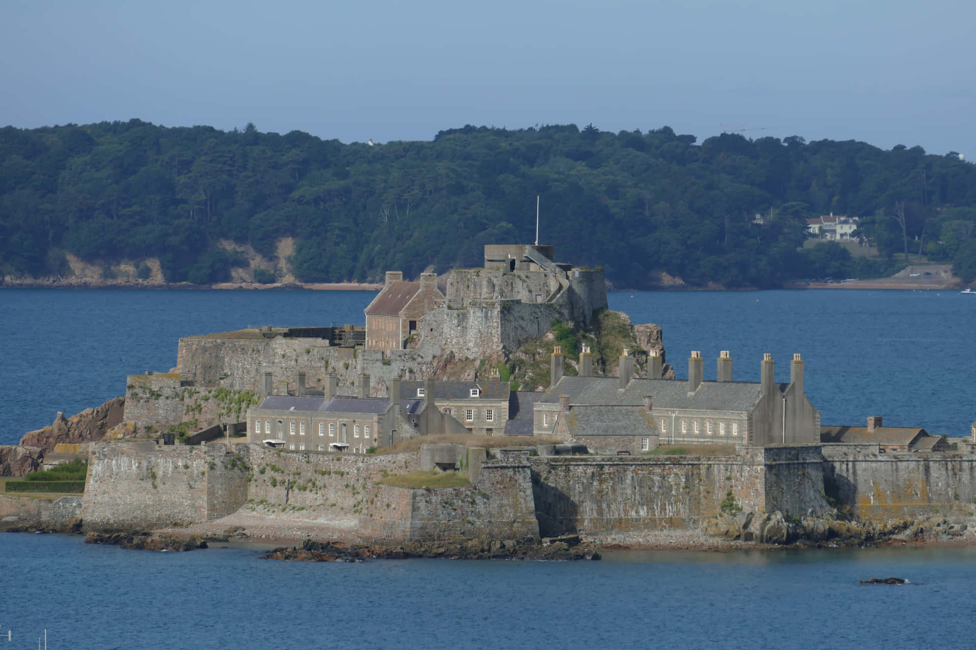 Coastal Fortress Overlooking Sea Wallpaper