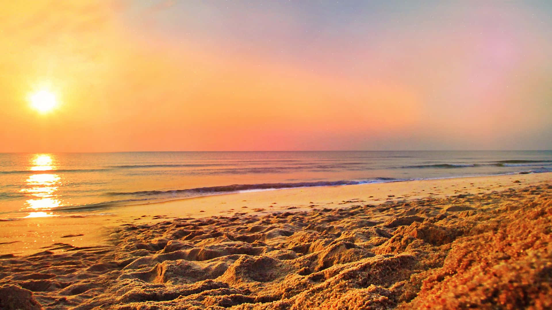 Caption: Breathtaking Coastal Sunset Wallpaper