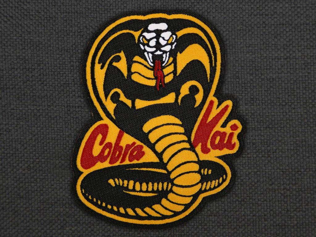 Own your legacy with the official Cobra Kai logo patchwork. Wallpaper