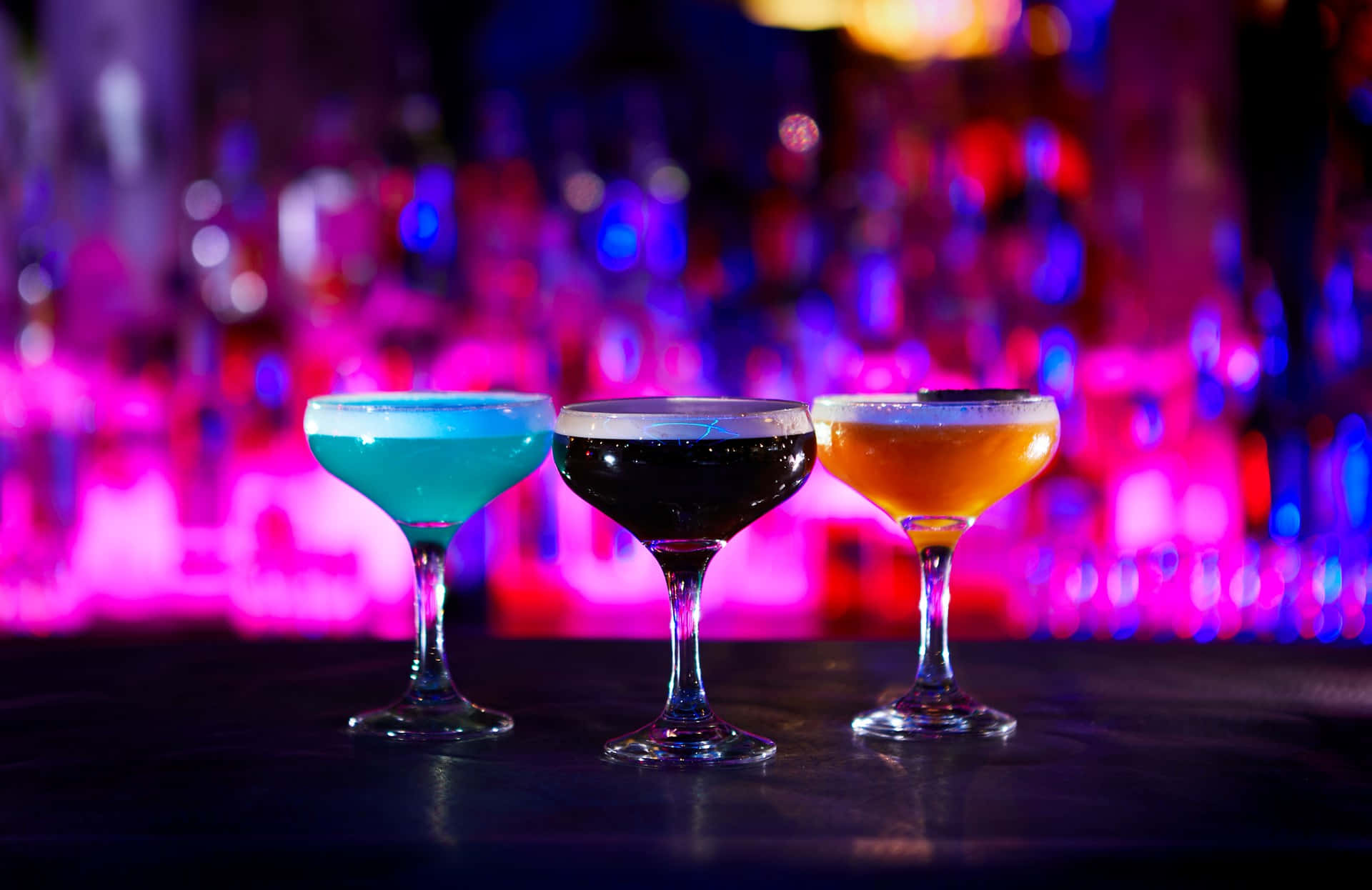 Cocktail Drinks On Purple Bar Counter Wallpaper
