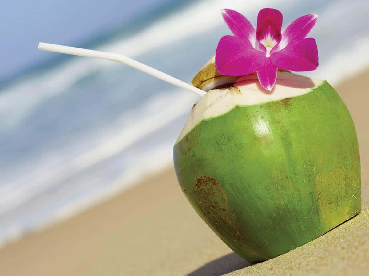 "A delicious and nutritious coconut at the beach."