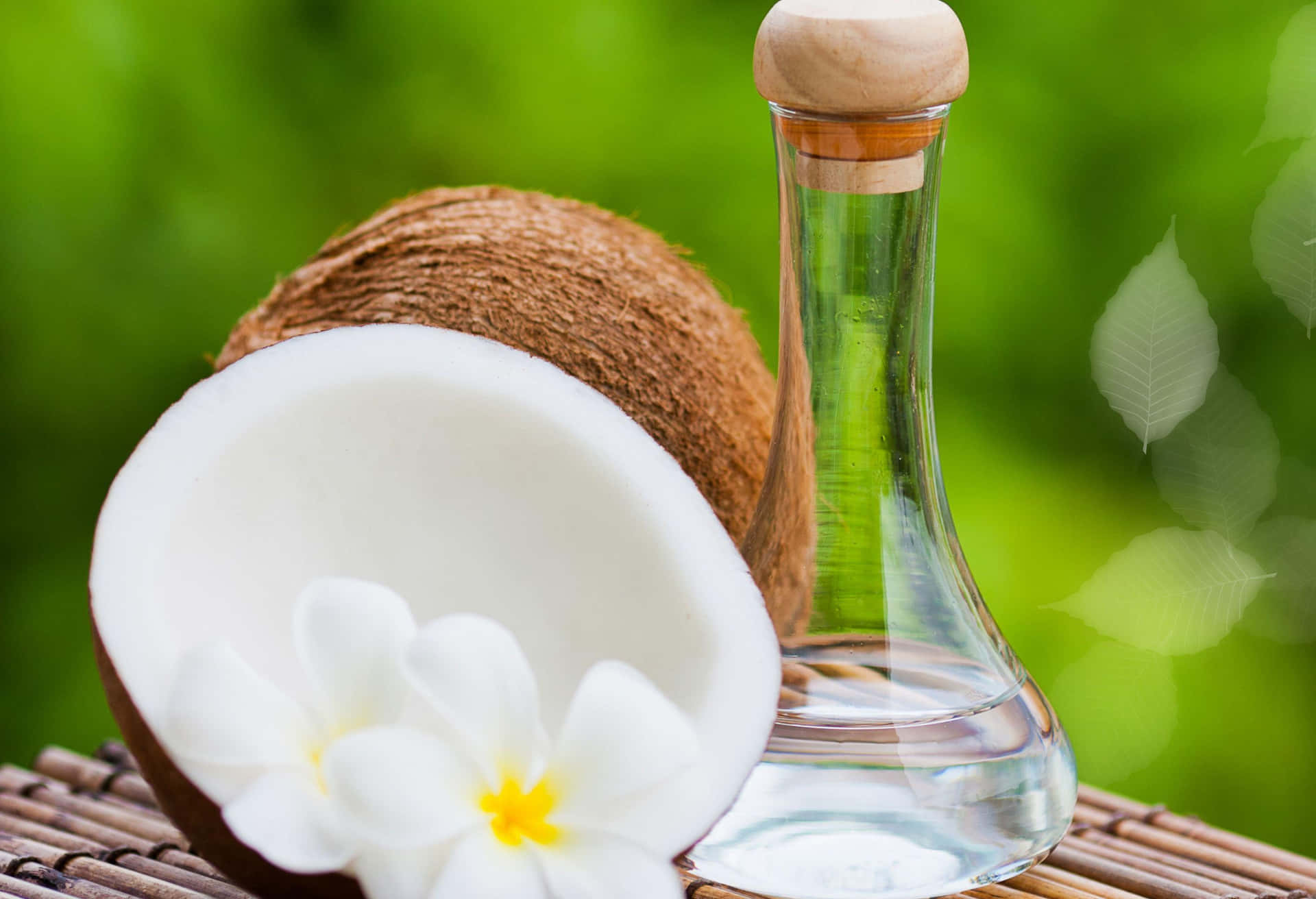 Coconut Oil And Flower On A Wooden Table
