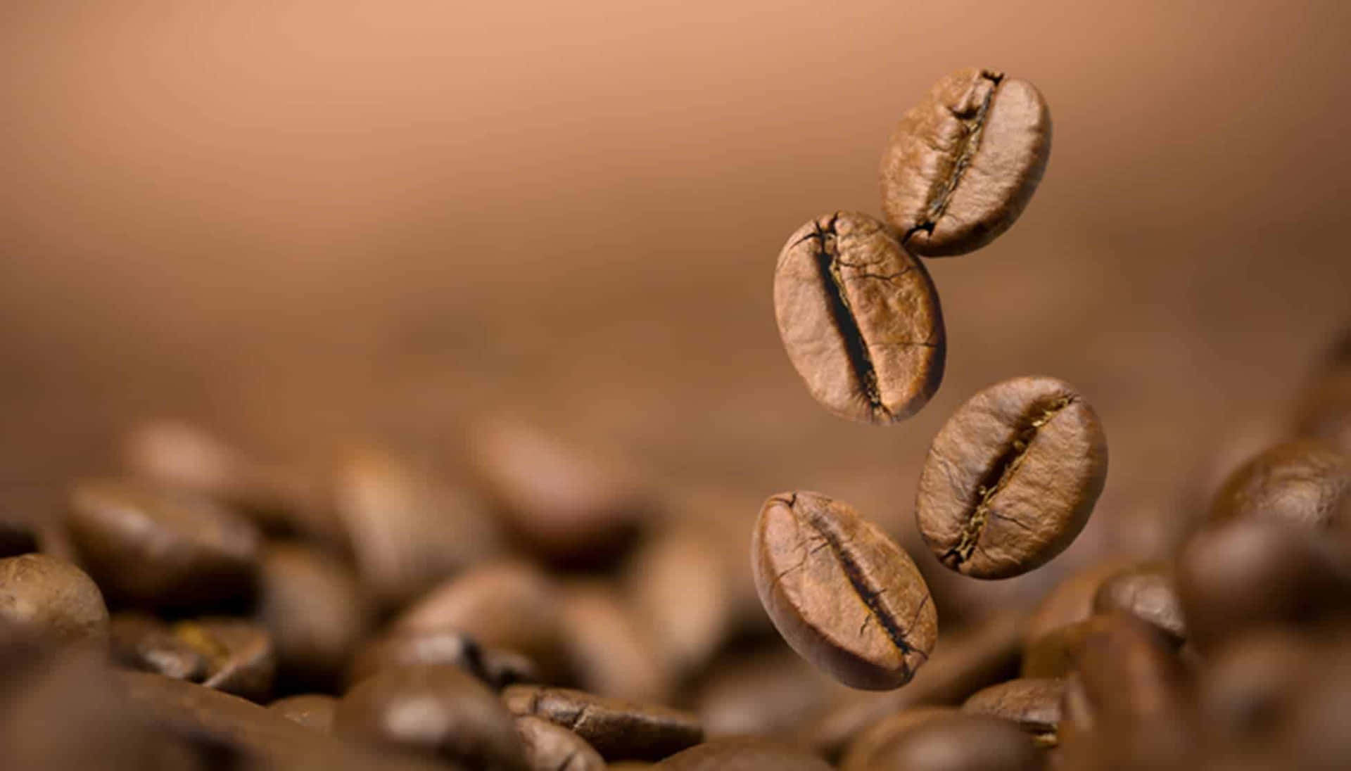 Coffee Beans Falling On A Brown Background