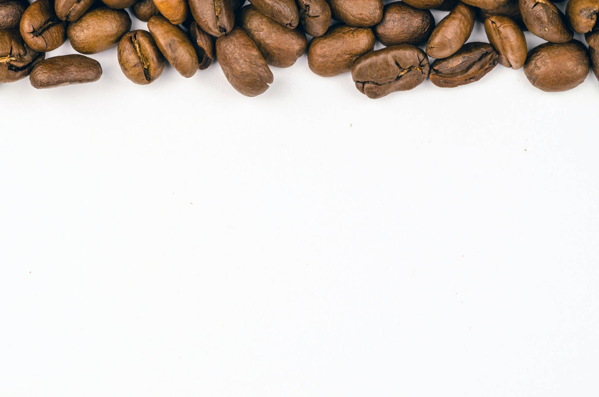 Coffee Beans On White Background Wallpaper