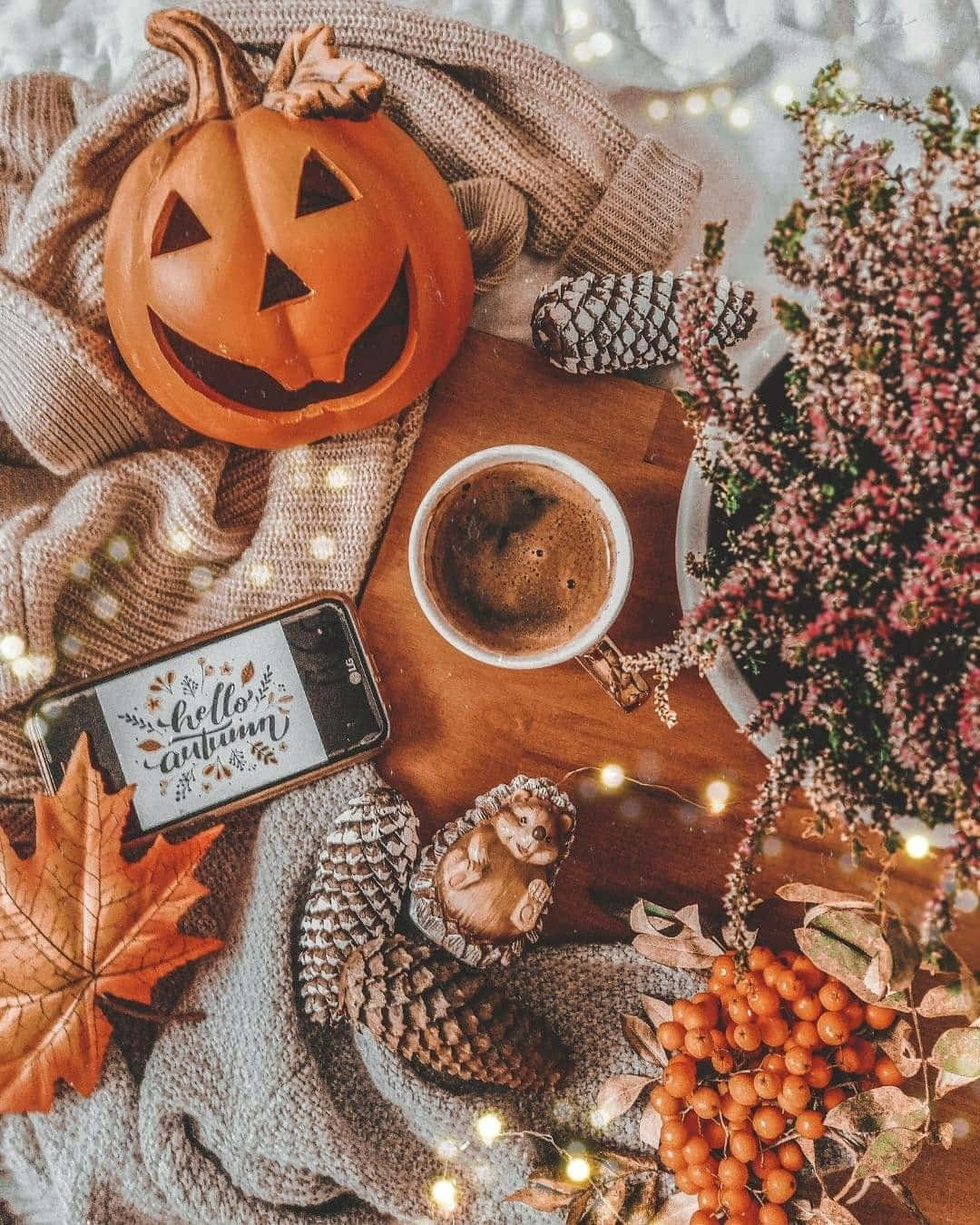 Coffee Cup Surrounded By Aesthetic Autumn Halloween Objects Wallpaper