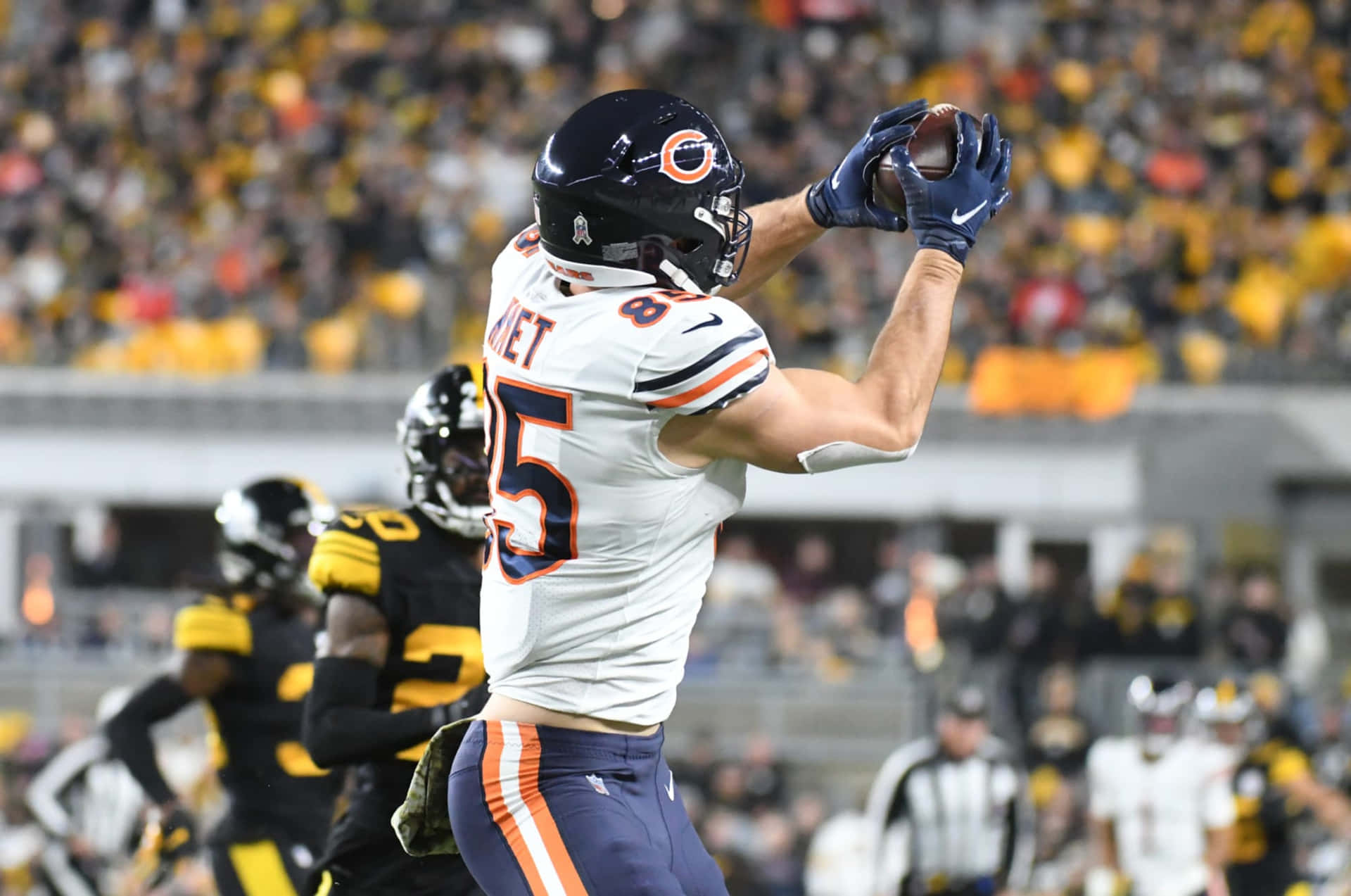 Cole Kmet Catching Football During Game Wallpaper