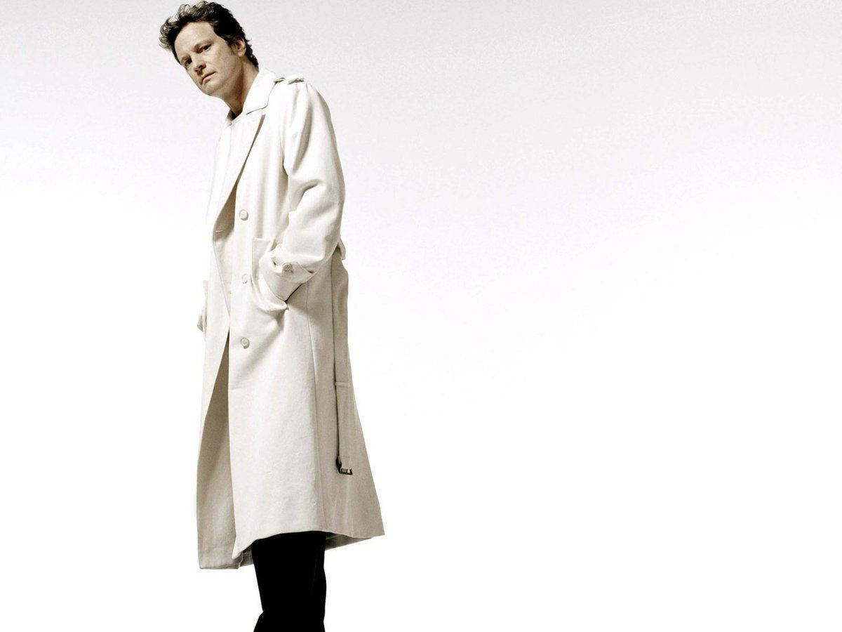 Colin Firth In White Trench Coat For Esquire Magazine Wallpaper