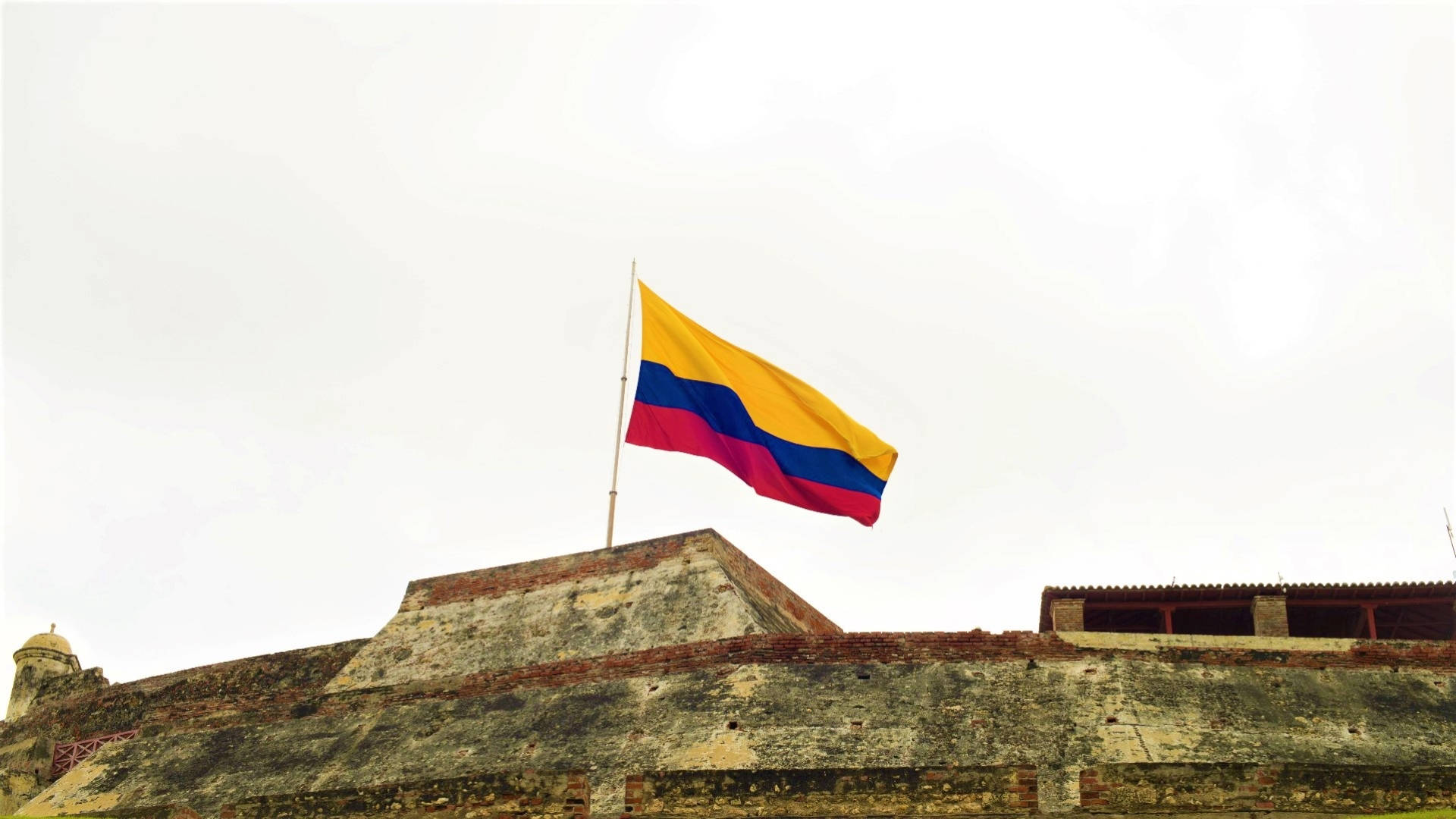 Bandiera Della Colombia Sul Tetto Sfondo