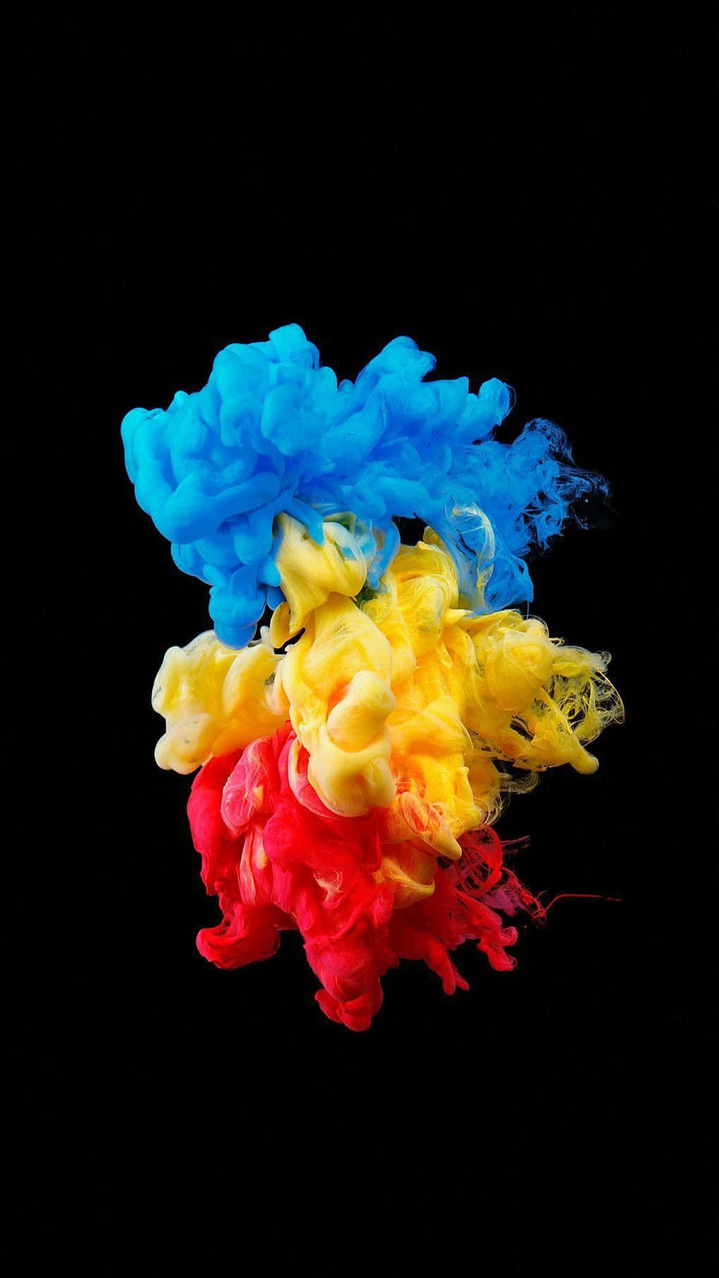 A Colorful Liquid Is Poured Over A Black Background