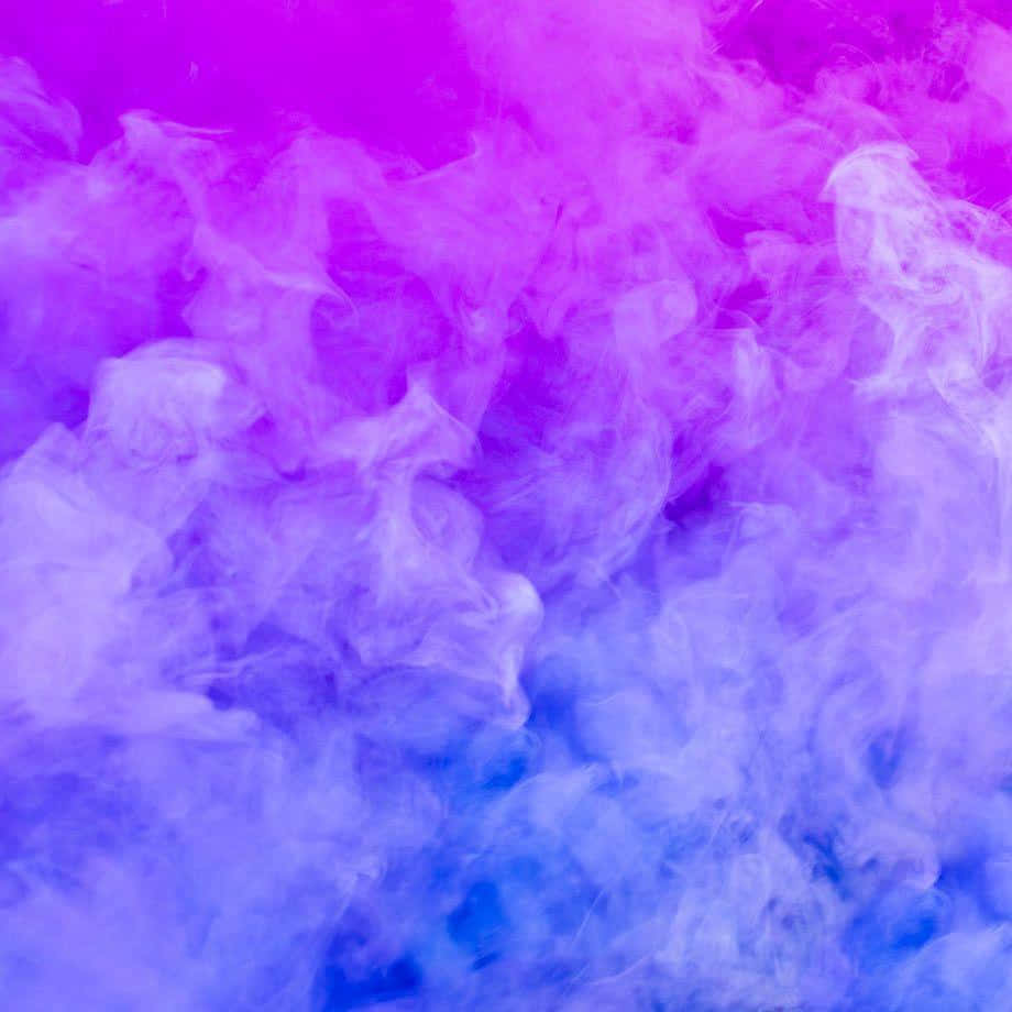 Colorful Smoke Against A Dark Background