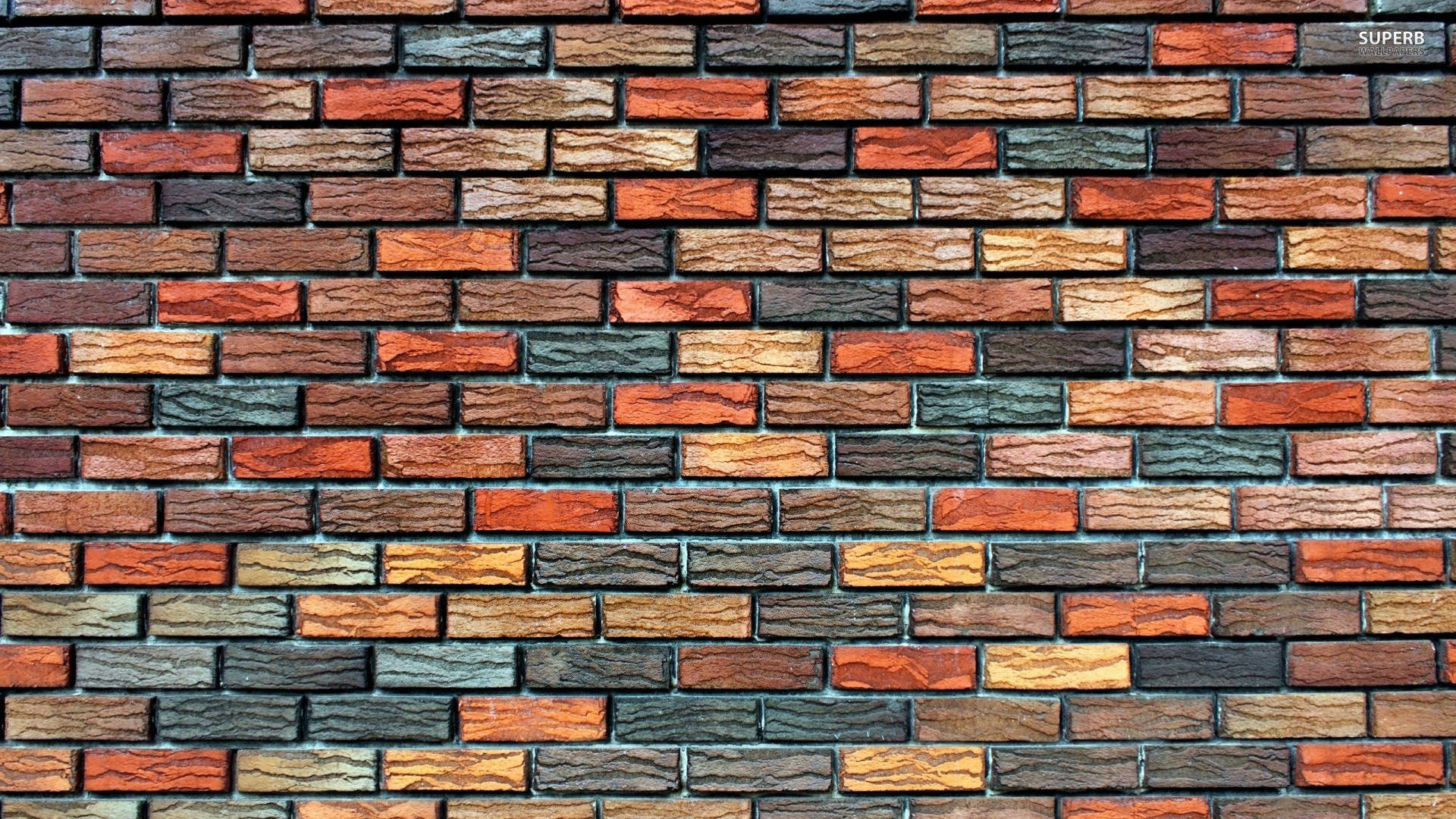 Vibrant Colored Brick Wall with Unique Squiggly Texture Wallpaper