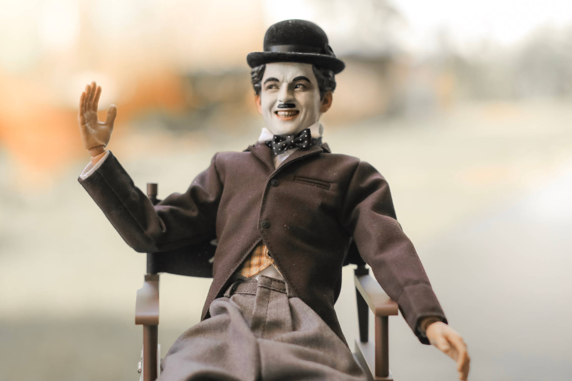 Colored Charlie Chaplin Figurine Background