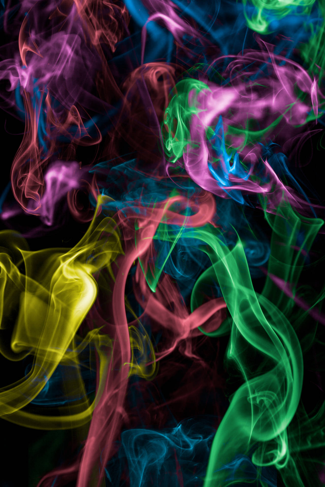 “Beautiful Colored Smoke Unfolds in Mid-Air” Wallpaper