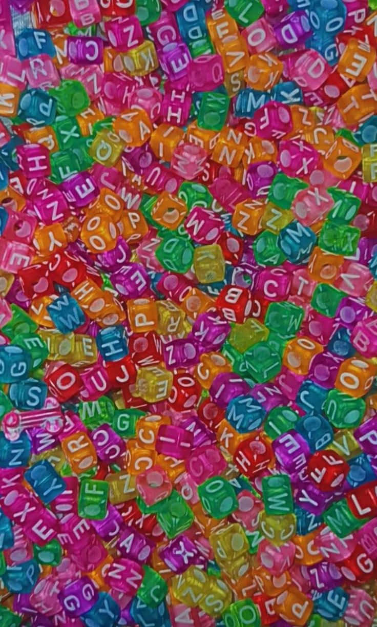 Colorful Alphabet Beads Background Wallpaper