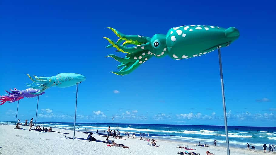 Colorful Beach Kite Festival Squids Wallpaper