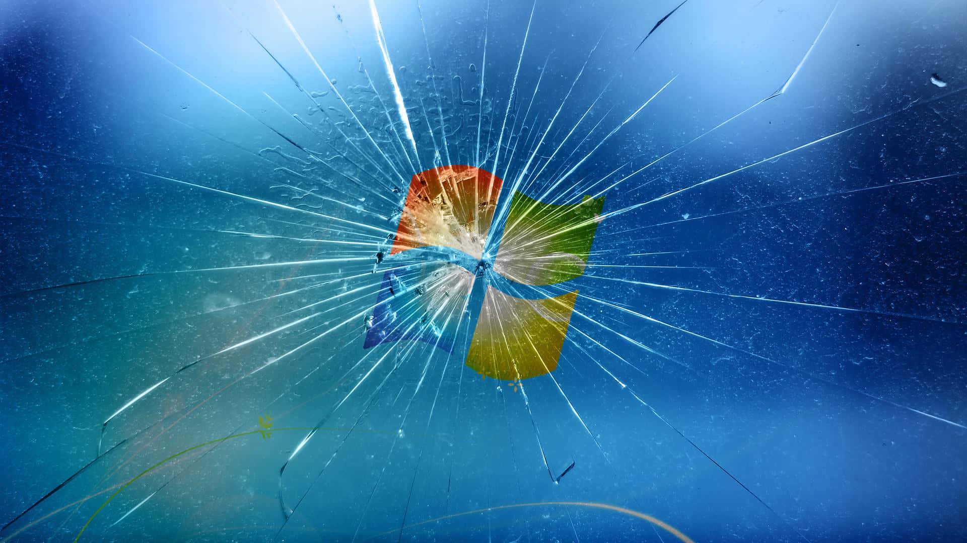 Colorful_ Beachball_on_ Cracked_ Screen Wallpaper