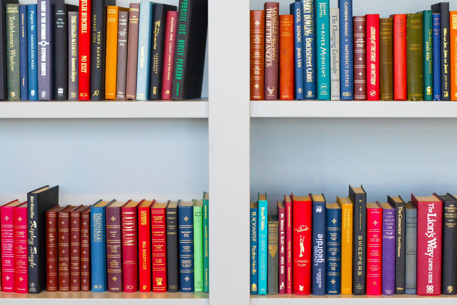 Colorful Books On Library Wallpaper