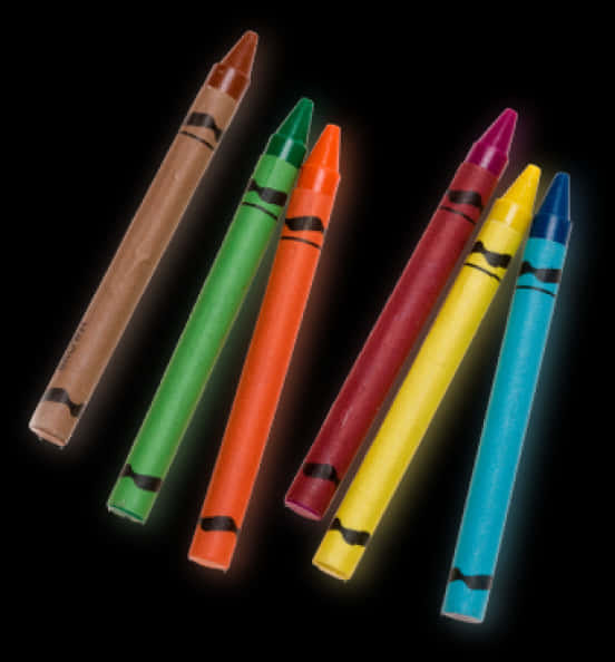 Colorful Crayons Arrangedon Black Background PNG