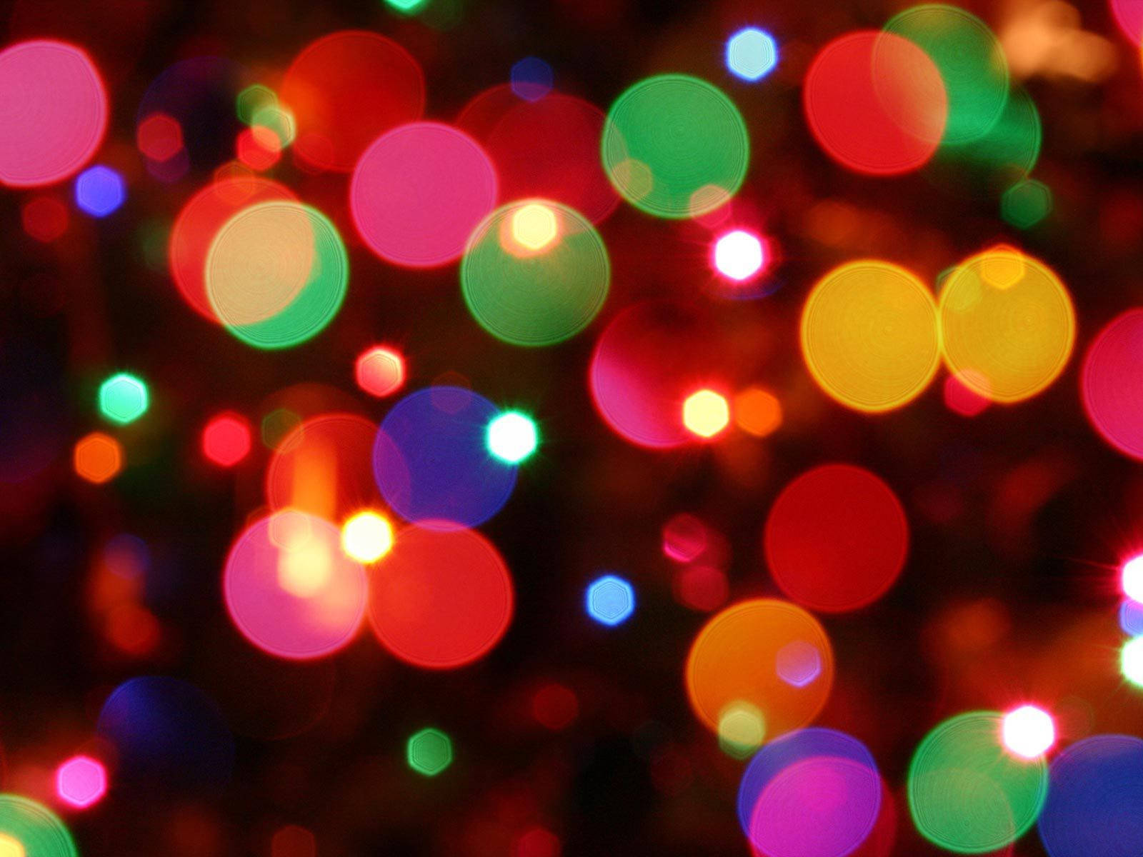 Lucesfestivas De Navidad Coloridas En Desenfoque Bokeh. Fondo de pantalla