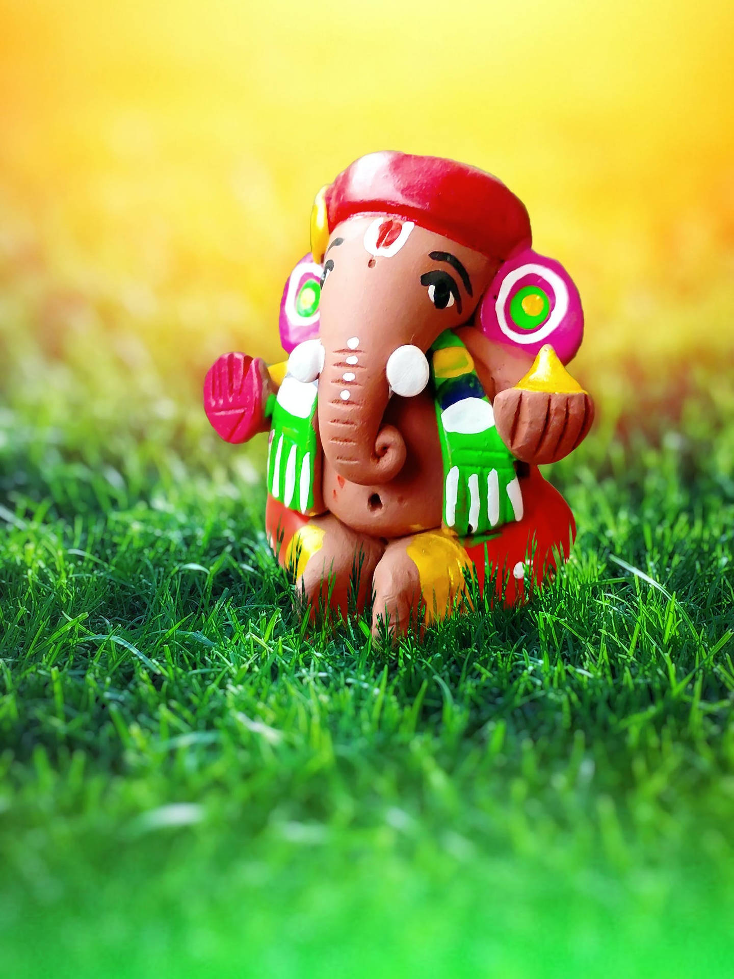 Figuritapequeña De Ganesha Colorida. Fondo de pantalla