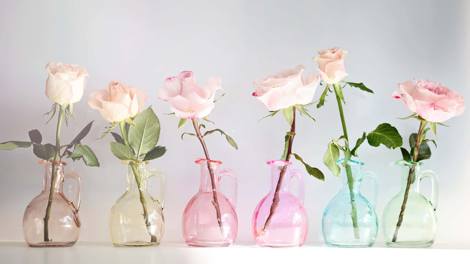 Colorful Glass Vaseswith Roses Wallpaper