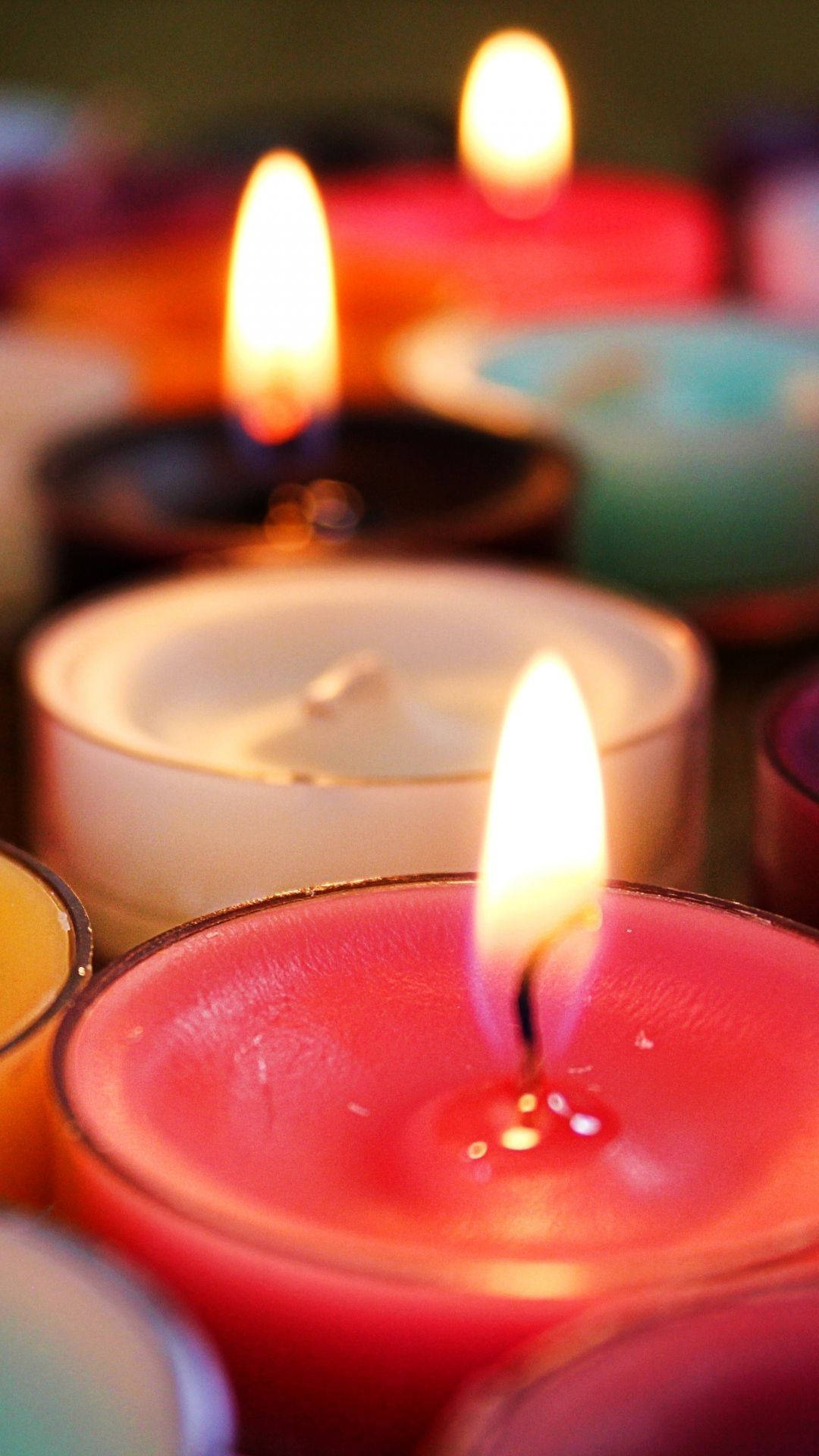 Colorful Glowing Candles Wallpaper