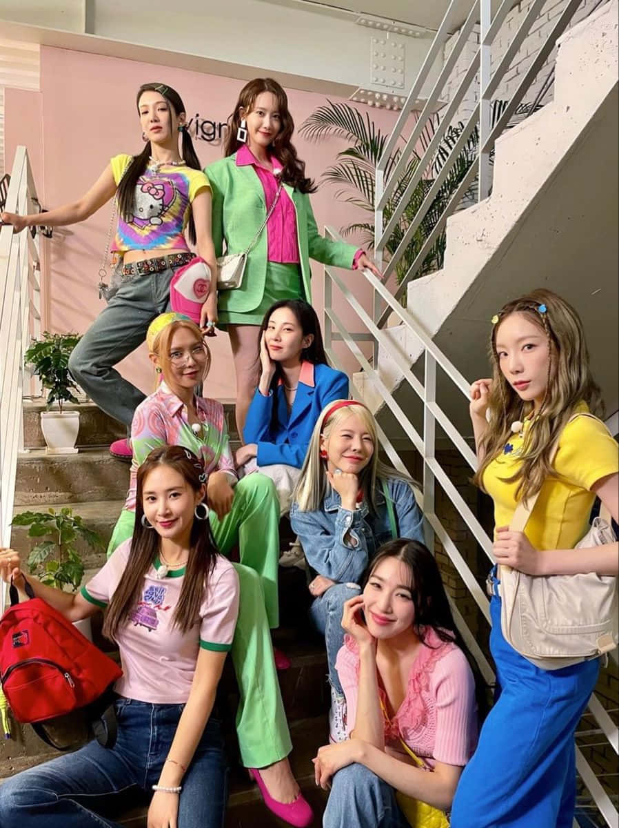 Colorful_ Group_ Staircase_ Pose Wallpaper