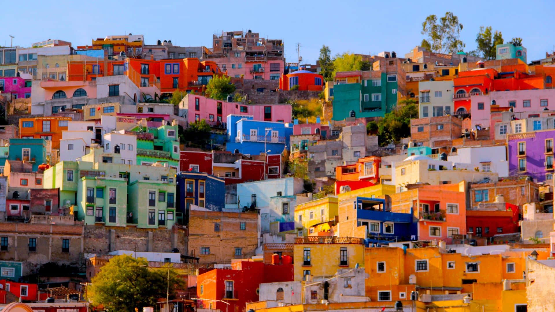 Colorful_ Hillside_ Homes_in_ Mexico Wallpaper