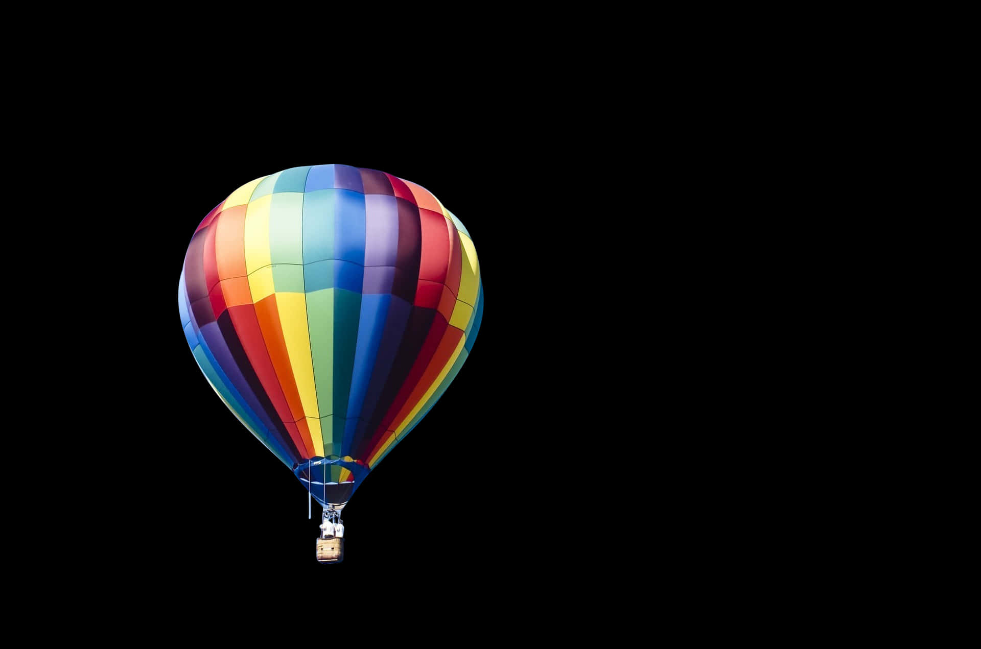 Colorful Hot Air Balloon Against Black Background PNG