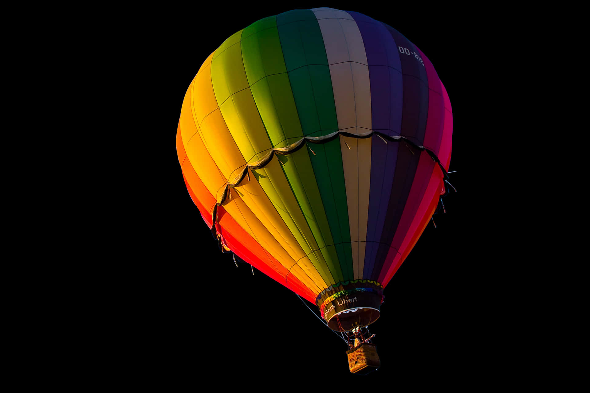 Colorful Hot Air Balloon Against Dark Background PNG