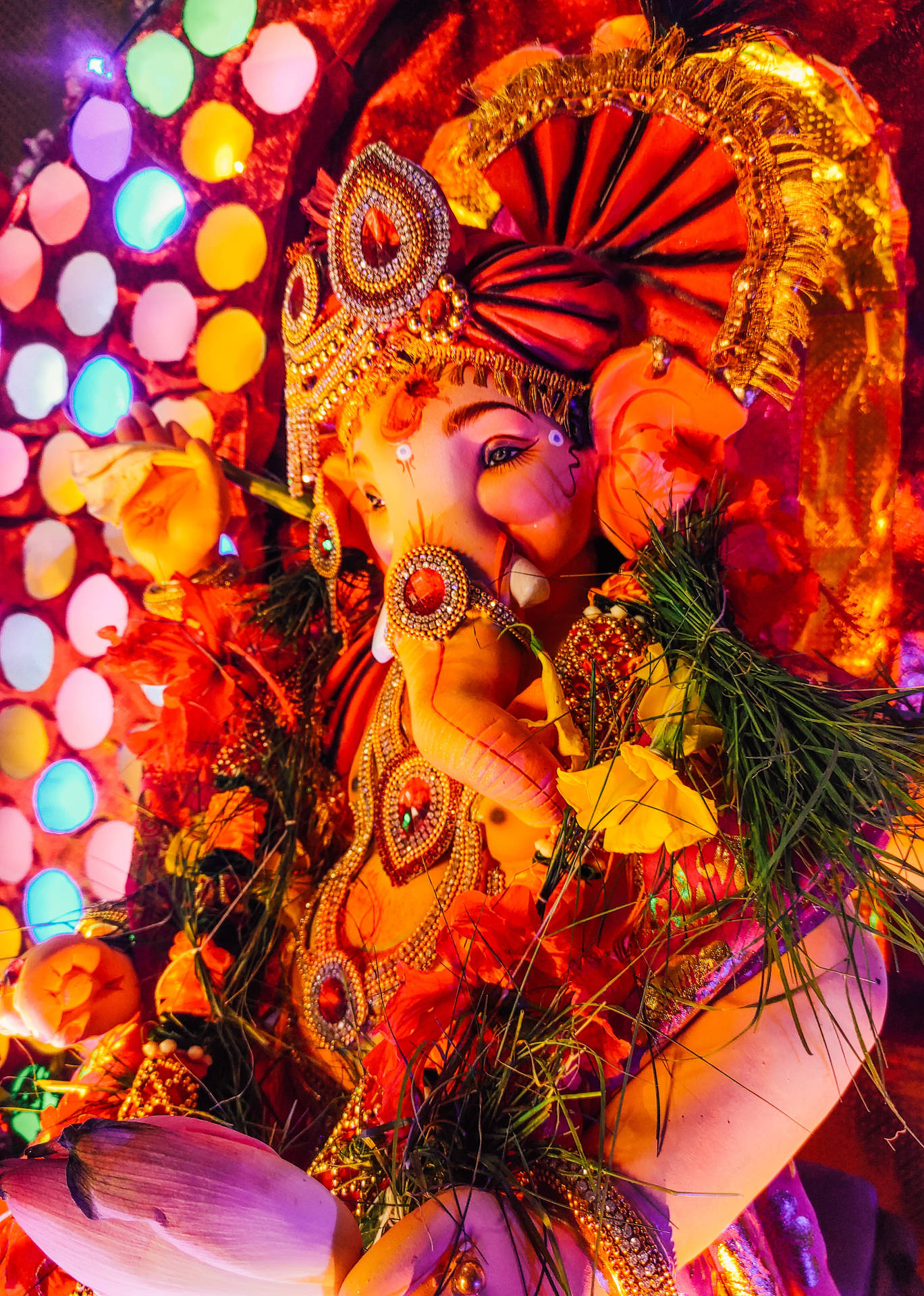 "Exquisite Ganesh in Radiant 4K Light Show" Wallpaper