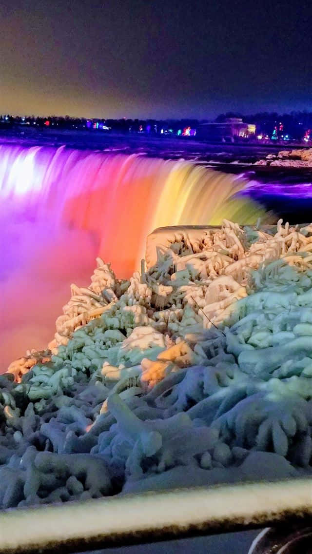 Colorful Niagara Falls Canada At Winter Night Wallpaper