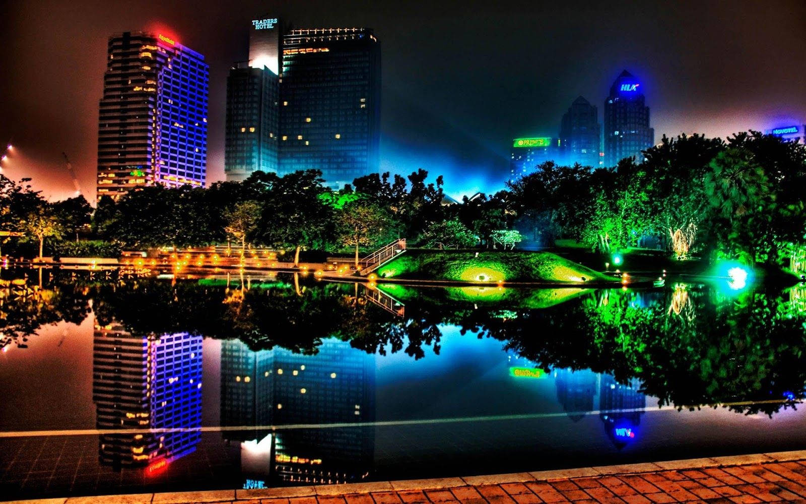 A View of a Colorful City at Night Wallpaper