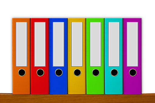 Colorful Office Binderson Shelf PNG